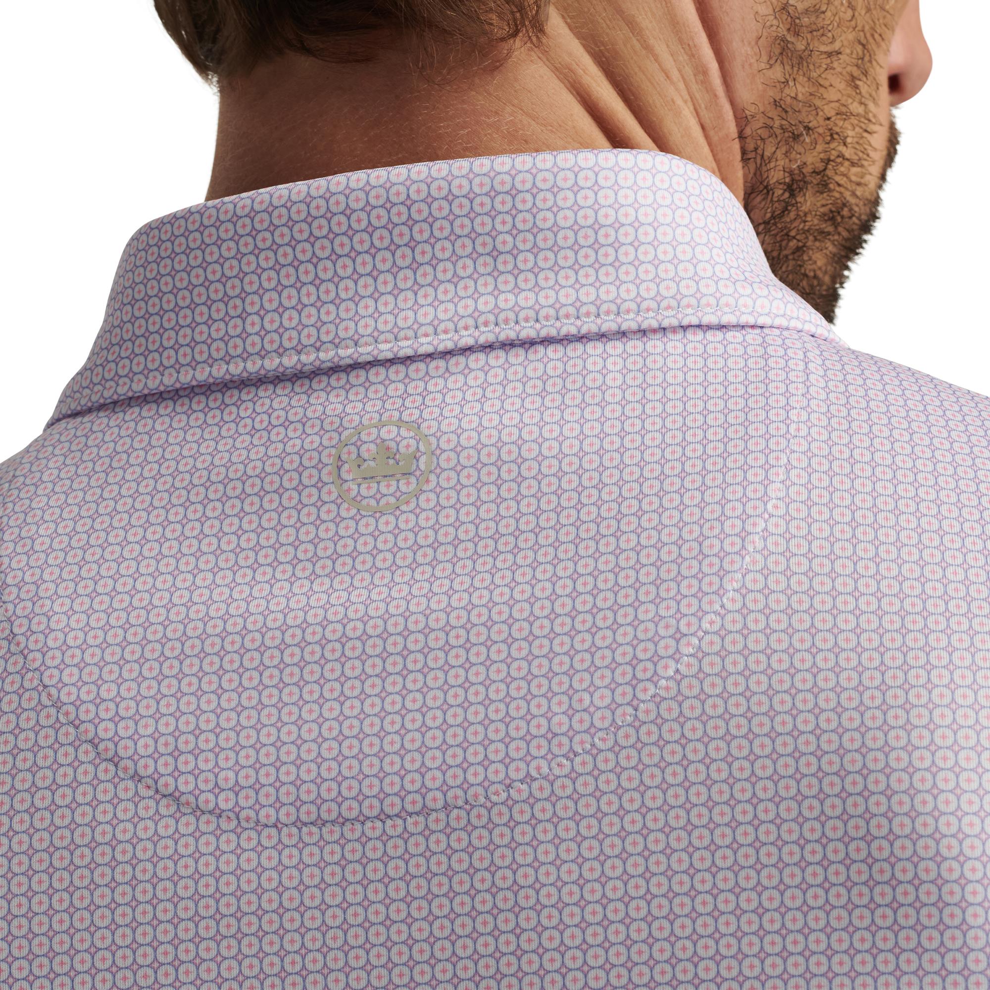 Close-up of back collar and Peter Millar logo on model – mens designer golf polo shirt